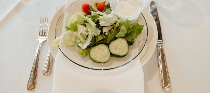 Fresh garden salad plated by the on-site kitchen